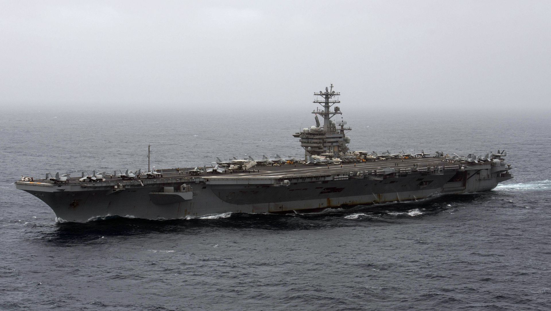 In this Sept. 7, 2020, file photo released by the U.S. Navy, the aircraft carrier USS Nimitz transits the Arabian Sea. In this Sept. 7, 2020, file photo released by the U.S. Navy, the aircraft carrier USS Nimitz transits the Arabian Sea. - Sputnik International, 1920, 17.02.2021