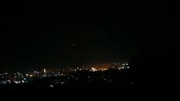 A screenshot from the video of the alleged anti-air missile exploding in the night sky in Syria - Sputnik International