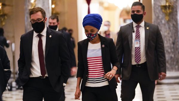 Rep. Ilhan Omar, D-Minn., walks to the House chamber on Capitol Hill in Washington, Wednesday, Jan. 13, 2021. - Sputnik International