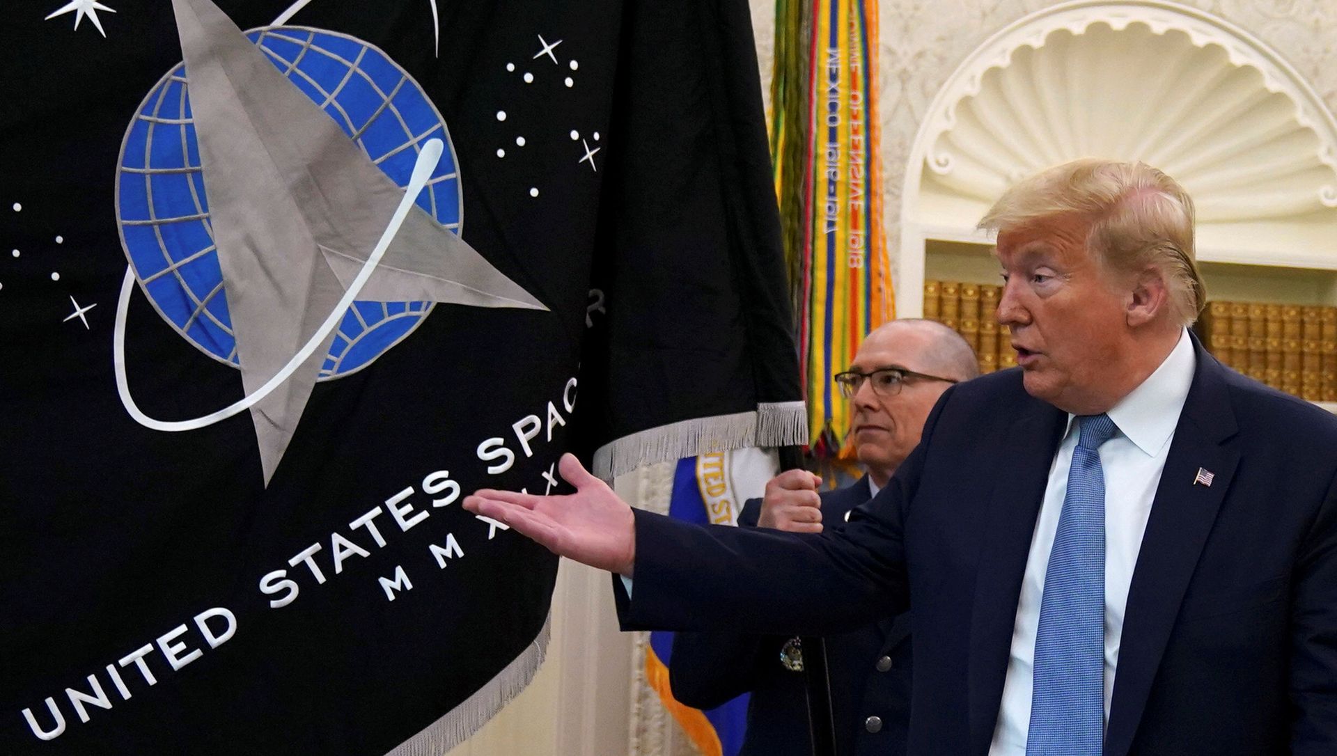 FILE PHOTO: Trump gestures towards the U.S. Space Force flag during its presentation at the White House in Washington FILE PHOTO: Trump gestures towards the U.S. Space Force flag during its presentation at the White House in Washington - Sputnik International, 1920, 04.02.2021