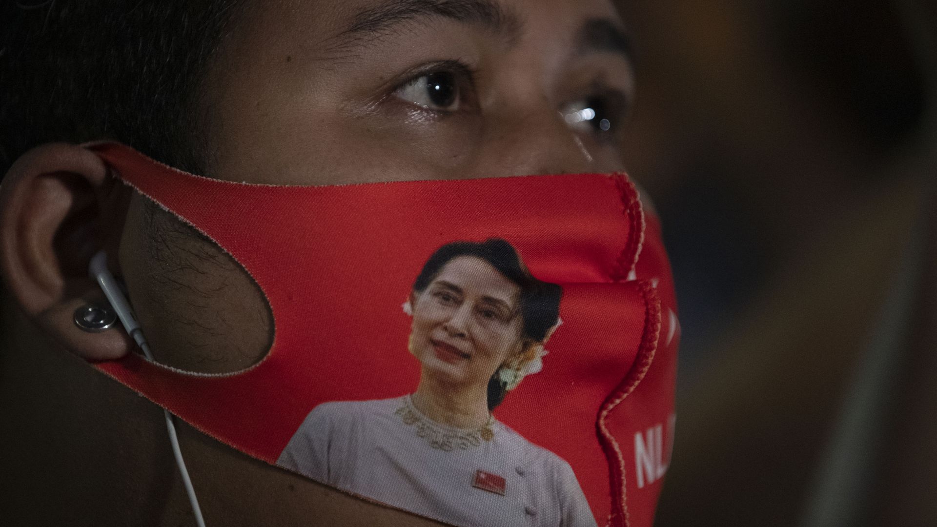 A Myanmar national living in Thailand wears a face mask with the image of Myanmar leader Aung San Suu Kyi during a protest in front of Myanmar Embassy in Bangkok, Thailand, Thursday, Feb. 4, 2021. The military announced Monday that it will take power for one year, accusing Suu Kyi's government of not investigating allegations of voter fraud in recent elections. Suu Kyi's party swept that vote and the military-backed party did poorly. The state Election Commission has refuted the allegations. A Myanmar national living in Thailand wears a face mask with the image of Myanmar leader Aung San Suu Kyi during a protest in front of Myanmar Embassy in Bangkok, Thailand, Thursday, Feb. 4, 2021. The military announced Monday that it will take power for one year, accusing Suu Kyi's government of not investigating allegations of voter fraud in recent elections. Suu Kyi's party swept that vote and the military-backed party did poorly. The state Election Commission has refuted the allegations. - Sputnik International, 1920, 16.02.2021