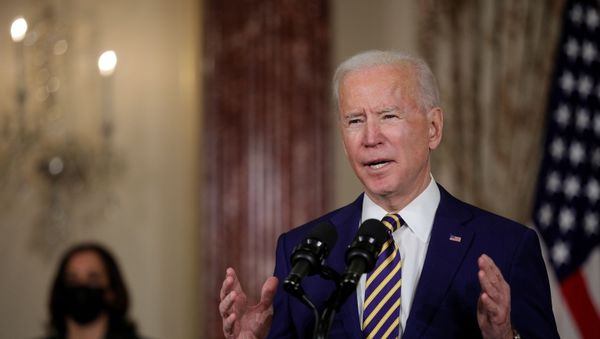 U.S. President Joe Biden delivers a foreign policy address as Vice President Kamala Harris listens during a visit to the State Department in Washington, U.S., February 4, 2021 - Sputnik International