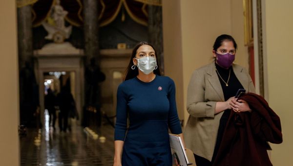 U.S. Rep. Alexandria Ocasio-Cortez (D-NY) walks through the U.S. Capitol - Sputnik International