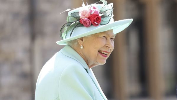 Britain's Queen Elizabeth smiles after awarding Captain Sir Thomas Moore his knighthood during a ceremony at Windsor Castle in Windsor, England, Friday, July 17, 2020. - Sputnik International