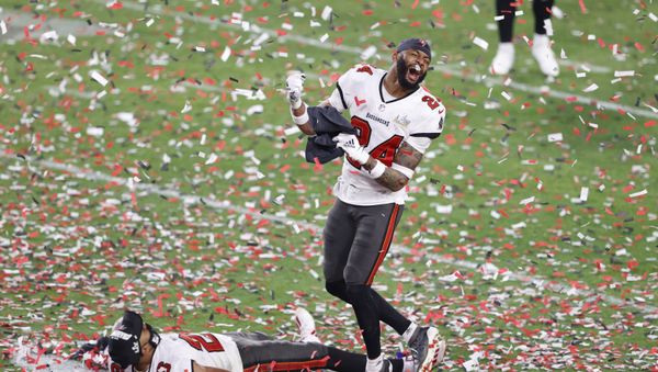 Feb 7, 2020; Tampa, FL, USA; Tampa Bay Buccaneers cornerback Carlton Davis (24) and defensive back Andrew Adams (26) celebrate after defeating the Kansas City Chiefs in Super Bowl LV at Raymond James Stadium. - Sputnik International