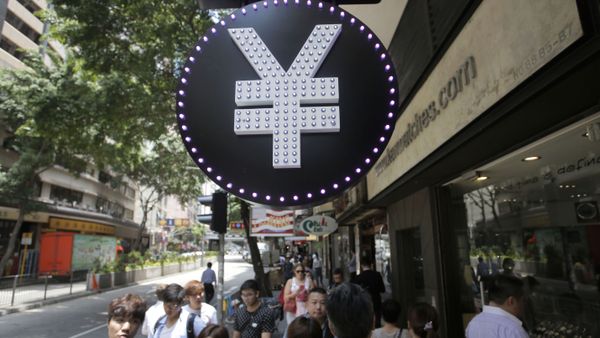 A Chinese yuan sign is seen at a currency exchange shop in Hong Kong, Tuesday, Aug. 11, 2015. China devalued its tightly controlled currency Tuesday following a slump in trade, allowing the yuan's biggest one-day decline in a decade. (AP Photo/Vincent Yu) - Sputnik International