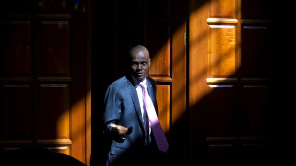 Haiti's President Jovenel Moise arrives for an interview at his home in Petion-Ville, a suburb of Port-au-Prince, Haiti, Friday, Feb. 7, 2020. Moise said Friday that he is optimistic that negotiations with a coalition of his political opponents will succeed in forging a power-sharing deal to end months of deadlock that have left the country without a functioning government. - Sputnik International