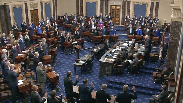 In this image from the video, Democrat Senator for Vermont Patrick Leahy, president for the time being of the Senate who is presiding over the impeachment trial of former President Donald Trump, swears in members of the Senate for the impeachment trial at the US Capitol in Washington, Tuesday, 26 January 2021. - Sputnik International