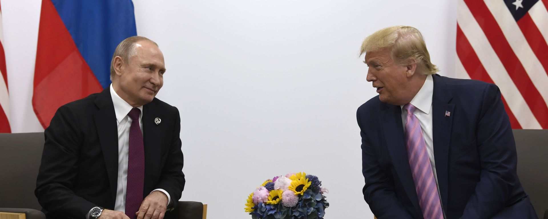  In this June 28, 2019, file photo, President Donald Trump, right, meets with Russian President Vladimir Putin during a bilateral meeting on the sidelines of the G-20 summit in Osaka, Japan. - Sputnik International, 1920, 20.01.2025