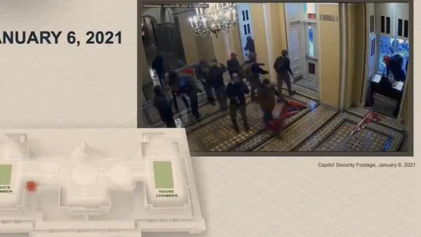Screenshot from the security footage of the deadly 6 January Capitol breach shown at the second day of Trump impeachment trial - Sputnik International