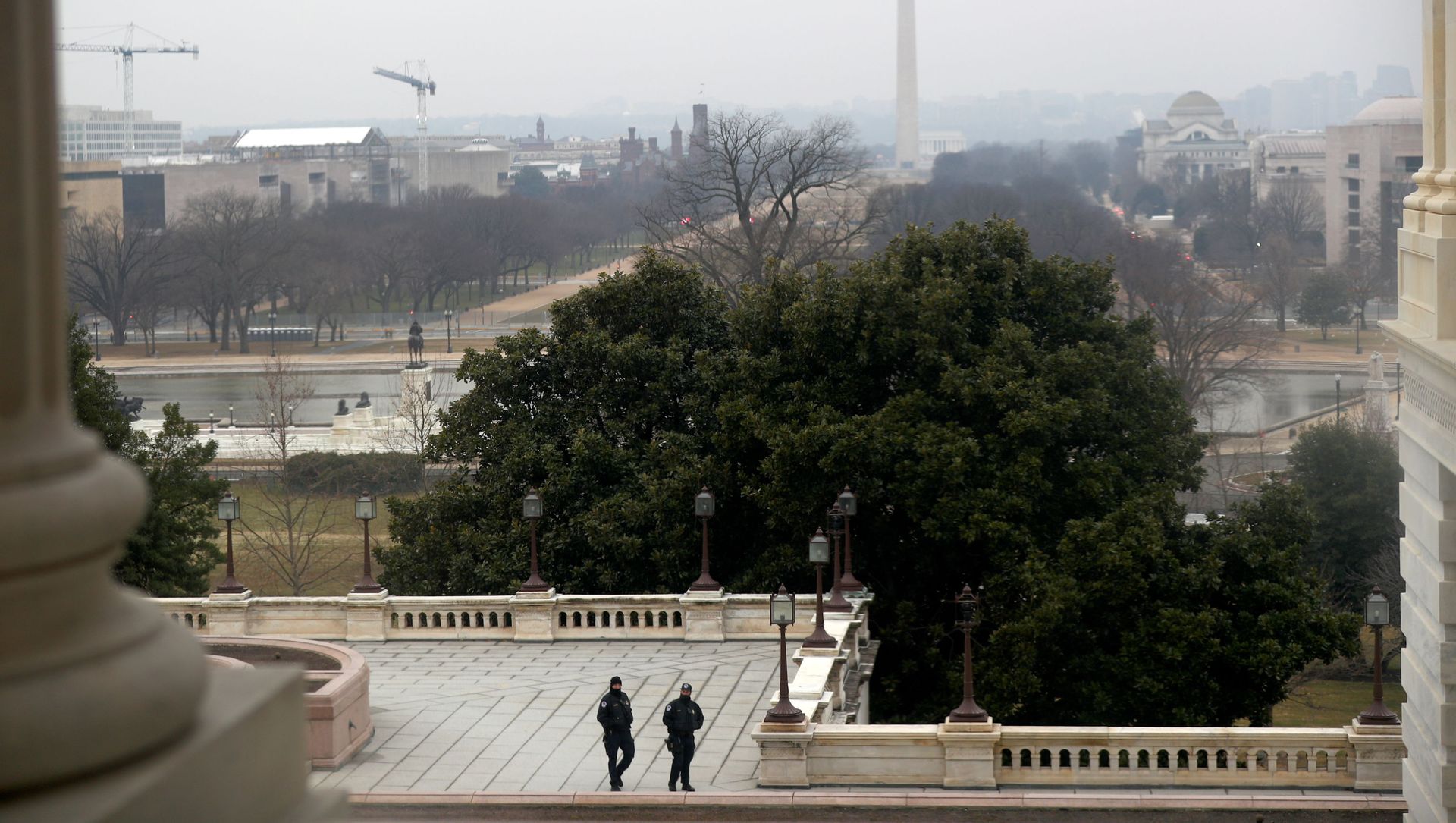 U.S. Capitol officers walk during the third day of senate impeachment hearings against former U.S. President Donald Trump, at the U.S. Capitol U.S. Capitol officers walk during the third day of senate impeachment hearings against former U.S. President Donald Trump, at the U.S. Capitol - Sputnik International, 1920, 12.02.2021