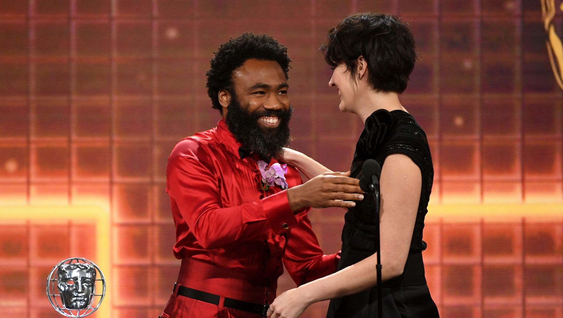 Phoebe Waller-Bridge (R) accepts the Britannia Award for British Artist of the Year from Donald Glover onstage during the 2019 British Academy Britannia Awards presented by American Airlines and Jaguar Land Rover at The Beverly Hilton Hotel on October 25, 2019 in Beverly Hills, California. Phoebe Waller-Bridge (R) accepts the Britannia Award for British Artist of the Year from Donald Glover onstage during the 2019 British Academy Britannia Awards presented by American Airlines and Jaguar Land Rover at The Beverly Hilton Hotel on October 25, 2019 in Beverly Hills, California. - Sputnik International, 1920, 13.02.2021