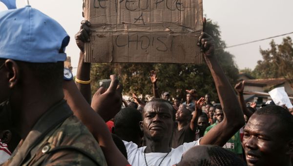 Supporters of President Faustin-Archange Touadera celebrate after highest court confirmed the re-election of Touadera, in Bangui, Central Africa Republic January 18, 2021. - Sputnik International