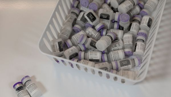 The Pfizer-BioNTech coronavirus disease (COVID-19) vaccine is taken out of the Ultra-Cold freezer at Skippack Pharmacy in Schwenksville, Pennsylvania, U.S., February 11, 2021. - Sputnik International