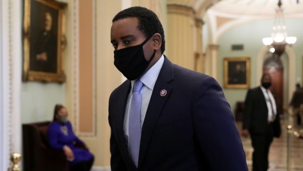 U.S. House impeachment manager Rep. Joe Neguse (D-CO) walks to the U.S. Senate floor for Day Two of the impeachment trial of former U.S. President Donald Trump - Sputnik International