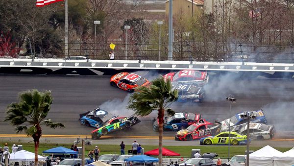 Feb 14, 2021; Daytona Beach, Florida, USA; NASCAR Cup Series drivers Ryan Newman (6), Erik Jones (43), William Byron (24) Tyler Reddick (8), Martin Truex Jr. (19), Aric Almirola (10) and Chris Buescher (17) wreck during the Daytona 500 at Daytona International Speedway. - Sputnik International