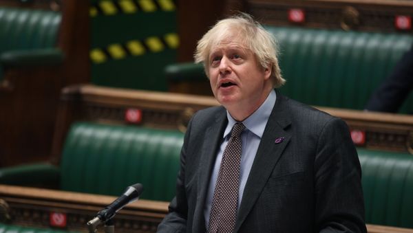 Britain's Prime Minister Boris Johnson speaks during a question period at the House of Commons in London, Britain January 27, 2021 - Sputnik International