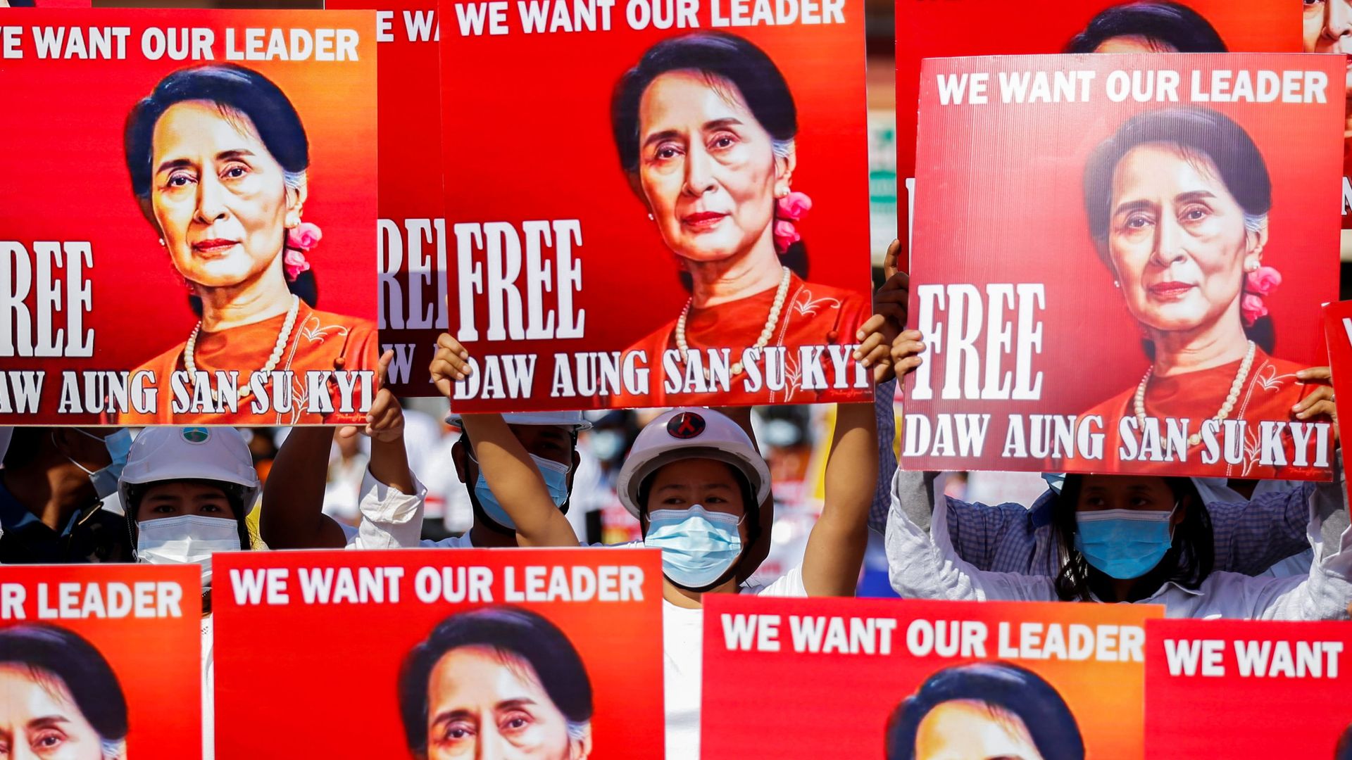 Demonstrators hold placards with the image of Aung San Suu Kyi during a protest against the military coup, in Naypyitaw, Myanmar, February 15, 2021. Demonstrators hold placards with the image of Aung San Suu Kyi during a protest against the military coup, in Naypyitaw, Myanmar, February 15, 2021. - Sputnik International, 1920, 15.02.2021