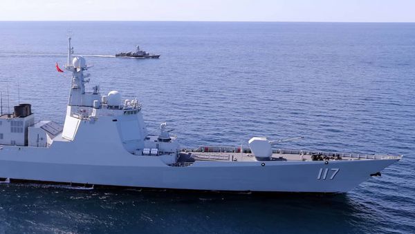In this photo provided Friday, Dec. 27, 2019, by the Iranian Army, two warships sail while approaching to Iran's southeastern port city of Chahbahar, in the Gulf of Oman.  - Sputnik International