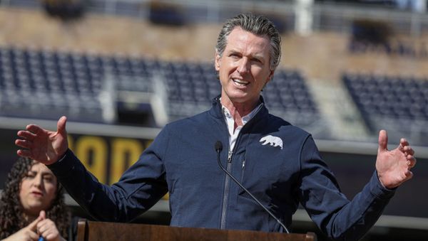 California Governor Gavin Newsom speaks to members of the media during a press conference at Petco Park, February 8, 2021 in San Diego, California, during a visit to the Petco Park Vaccination Supersite. - The Petco Park Vaccination Supersite, which is hosted in a parking lot next to the ballpark, is a partnership between San Diego County, the San Diego Padres baseball team and UC San Diego Health and has capacity to dole out about 5,000 COVID-19 vaccines per day. - Sputnik International