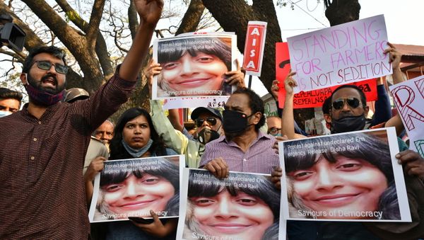 People hold placards during a protest against the arrest of climate activist Disha Ravi, in Bengaluru, India, 15 February 2021 - Sputnik International