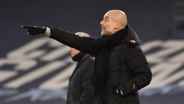Soccer Football - Premier League - Manchester City v Tottenham Hotspur - Etihad Stadium, Manchester, Britain - February 13, 2021 Manchester City manager Pep Guardiola reacts Soccer Football - Premier League - Manchester City v Tottenham Hotspur - Etihad Stadium, Manchester, Britain - February 13, 2021 Manchester City manager Pep Guardiola reacts - Sputnik International