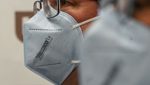 A virucidal protective face mask to fight the spread of the coronavirus Covid-19 is pictured at Lille's university headquarters on Fabruary 16, 2021. - Sputnik International