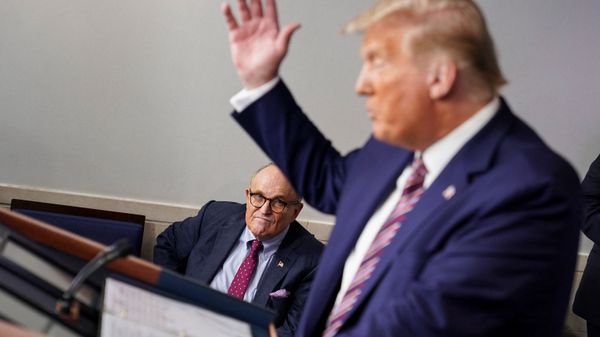Former New York Mayor Rudy Giuliani listens as U.S. President Donald Trump speaks during a news conference in the Briefing Room of the White House on September 27, 2020 in Washington, DC. - Sputnik International