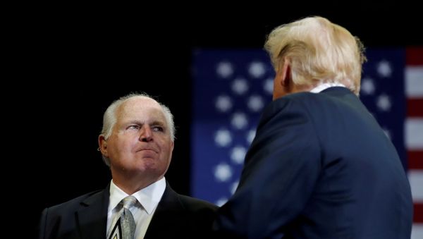 Talk show host Rush Limbaugh introduces U.S. President Donald Trump on the eve of the U.S. mid-term elections at a campaign rally at the Show Me Center in Cape Girardeau, Missouri, U.S., November 5, 2018 Talk show host Rush Limbaugh introduces U.S. President Donald Trump on the eve of the U.S. mid-term elections at a campaign rally at the Show Me Center in Cape Girardeau, Missouri, U.S., November 5, 2018 - Sputnik International