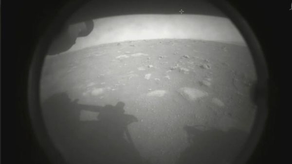 Image released by the US' National Aeronautics and Space Administration marks the very first photo snapped by the Perseverance rover after its historic landing on the distant red planet on February 18, 2021. - Sputnik International