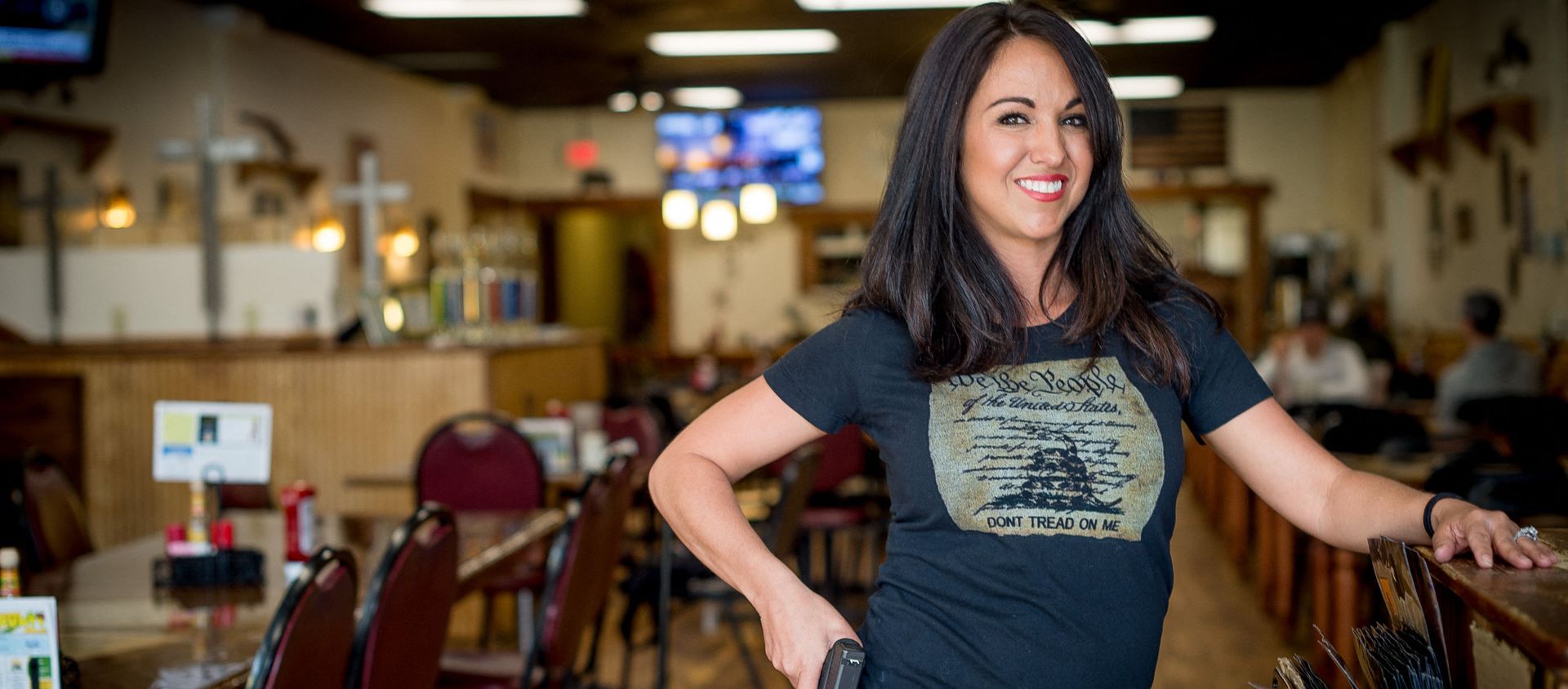 In this file photo owner Lauren Boebert poses for a portrait at Shooters Grill in Rifle, Colorado on April 24, 2018. - A Republican member of the US Congress raised eyebrows on February 18, 2021 when she appeared at a Zoom committee meeting with an arsenal of guns strategically displayed in her background. In this file photo owner Lauren Boebert poses for a portrait at Shooters Grill in Rifle, Colorado on April 24, 2018. - A Republican member of the US Congress raised eyebrows on February 18, 2021 when she appeared at a Zoom committee meeting with an arsenal of guns strategically displayed in her background. - Sputnik International, 1920, 19.02.2021
