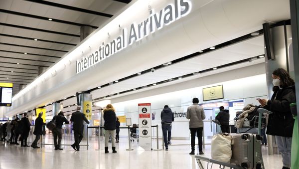 Travellers stand at Terminal 2 of Heathrow Airport, amid the coronavirus disease (COVID-19) outbreak in London, Britain February 14, 2021 Travellers stand at Terminal 2 of Heathrow Airport, amid the coronavirus disease (COVID-19) outbreak in London, Britain February 14, 2021 - Sputnik International
