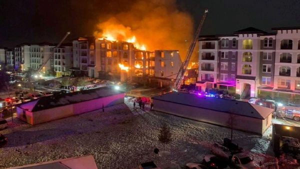 A general view of an apartment building engulfed in flames in San Antonio, Texas, U.S. February 18, 2021 in this picture obtained from social media - Sputnik International