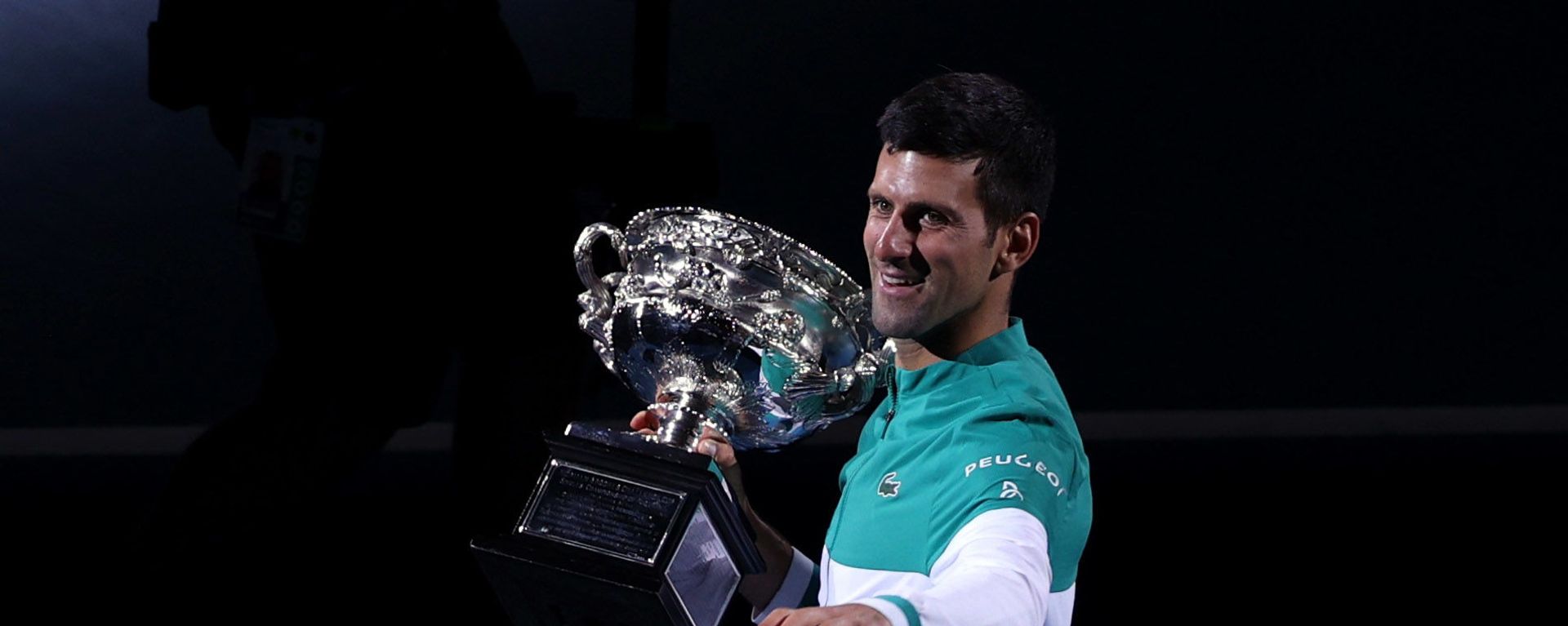 Australian Open - Men's Singles Final - Melbourne Park, Melbourne, Australia, February 21, 2021 Serbia's Novak Djokovic celebrates with the trophy after winning his final match against Russia's Daniil Medvedev Australian Open - Men's Singles Final - Melbourne Park, Melbourne, Australia, February 21, 2021 Serbia's Novak Djokovic celebrates with the trophy after winning his final match against Russia's Daniil Medvedev - Sputnik International, 1920, 21.02.2021