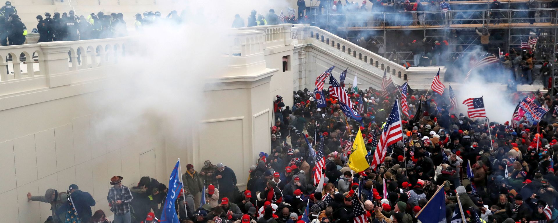 Police release tear gas into a crowd of pro-Trump protesters during clashes at a rally to contest the certification of the 2020 U.S. presidential election results by the U.S. Congress, at the U.S. Capitol Building in Washington, U.S, January 6, 2021. Police release tear gas into a crowd of pro-Trump protesters during clashes at a rally to contest the certification of the 2020 U.S. presidential election results by the U.S. Congress, at the U.S. Capitol Building in Washington, U.S, January 6, 2021. - Sputnik International, 1920, 21.05.2021