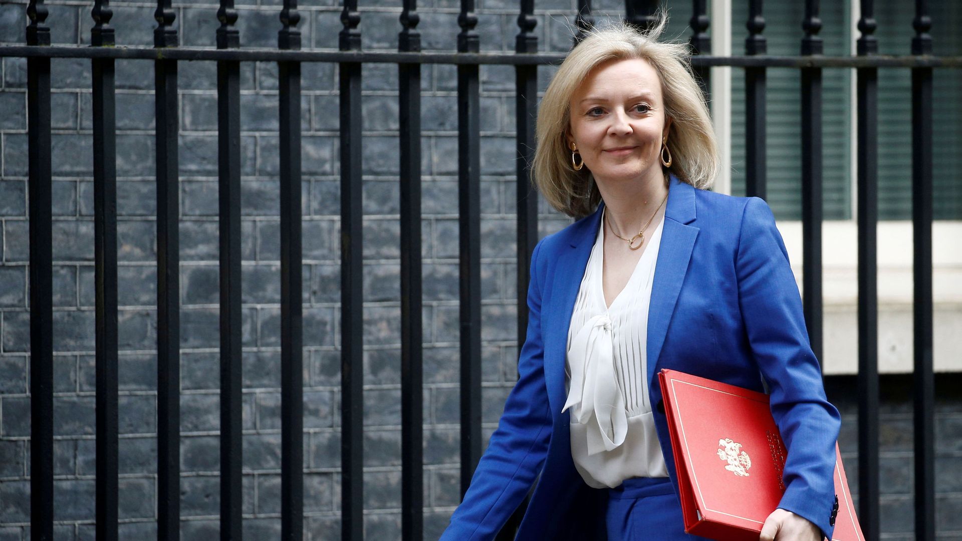 Britain's Secretary of State of International Trade and Minister for Women and Equalities Liz Truss is seen outside Downing Street, in London, Britain March 17, 2020. Britain's Secretary of State of International Trade and Minister for Women and Equalities Liz Truss is seen outside Downing Street, in London, Britain March 17, 2020. - Sputnik International, 1920, 25.02.2021