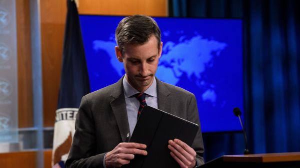 U.S. State Department spokesman Ned Price leaves after the during daily press briefing at the State Department in Washington, DC, U.S., February 22, 2021 - Sputnik International