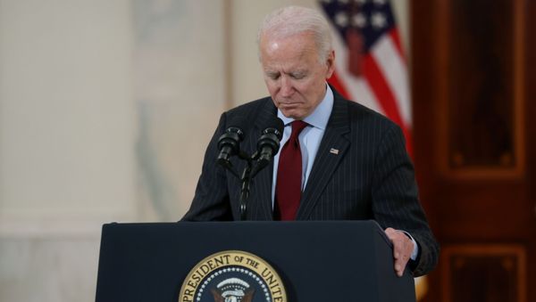 US President Joe Biden concludes his remarks in honor of the 500,000 US deaths from the coronavirus disease (COVID-19), in the Cross Hall at the White House in Washington, U.S., February 22, 2021 - Sputnik International