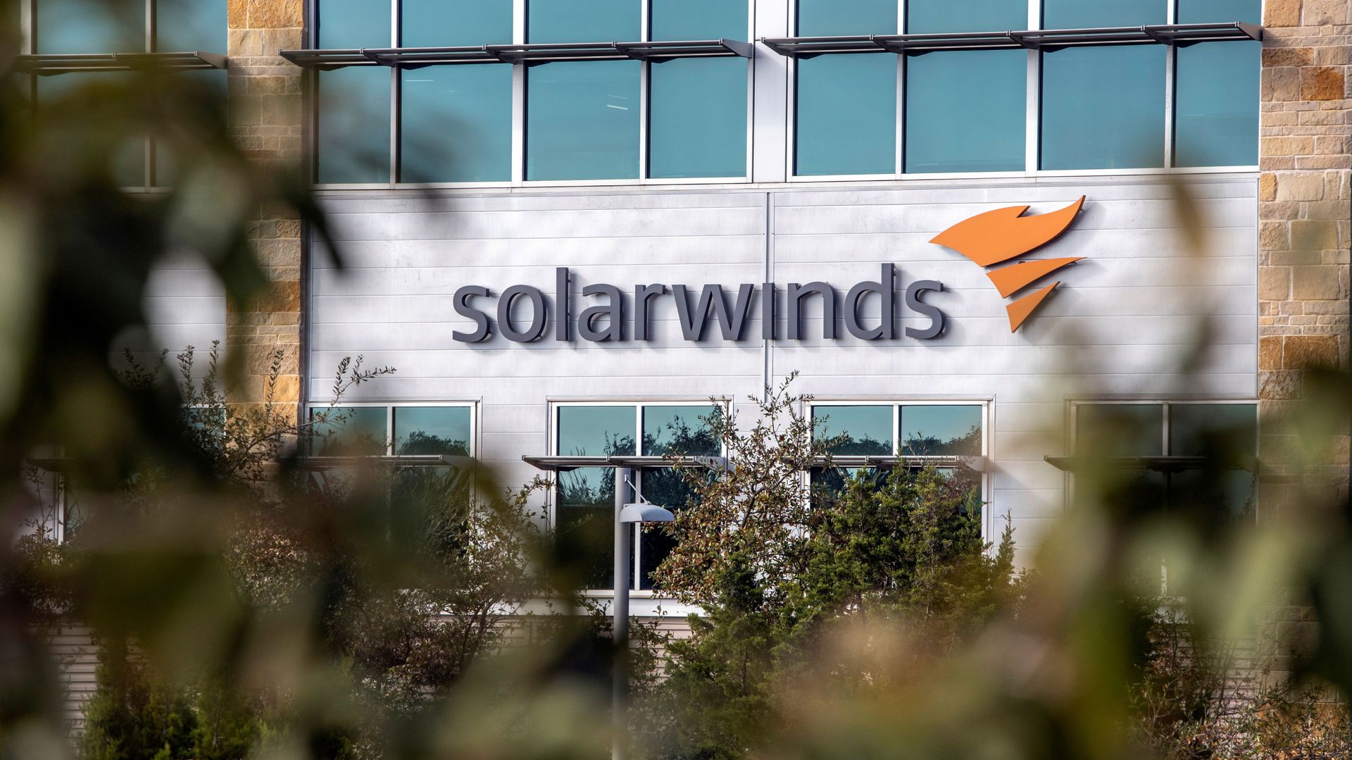 FILE PHOTO: The SolarWinds logo is seen outside its headquarters in Austin, Texas, U.S., December 18, 2020. FILE PHOTO: The SolarWinds logo is seen outside its headquarters in Austin, Texas, U.S., December 18, 2020. - Sputnik International, 1920, 18.04.2021
