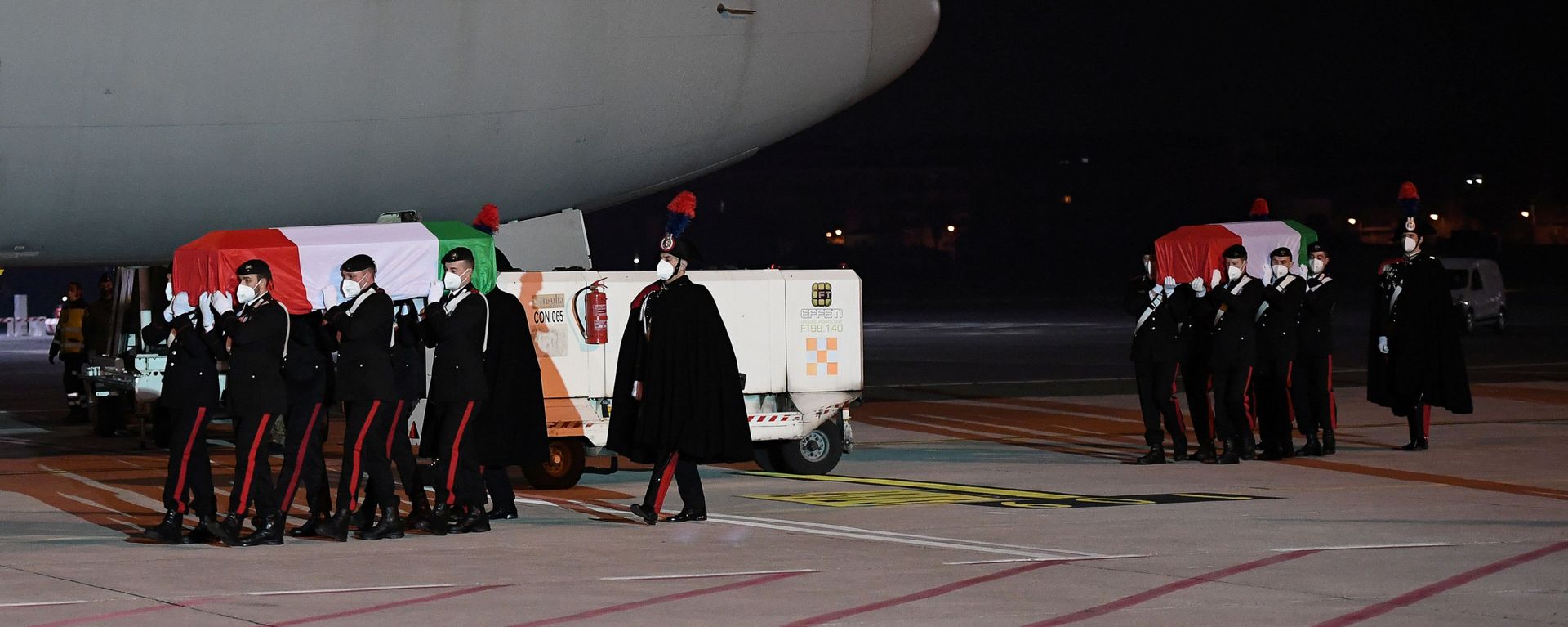 The bodies of Italian ambassador Luca Attanasio and his bodyguard Vittorio Iacovacci arrive back at Rome's Ciampino airport following a deadly attack in the Democratic Republic of Congo, in Rome, Italy, February 23, 2021.  - Sputnik International, 1920, 24.02.2021