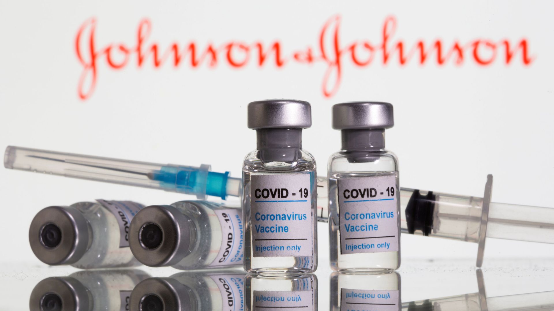 Vials labelled COVID-19 Coronavirus Vaccine and sryinge are seen in front of displayed Johnson&Johnson logo in this illustration taken, February 9, 2021 Vials labelled COVID-19 Coronavirus Vaccine and sryinge are seen in front of displayed Johnson&Johnson logo in this illustration taken, February 9, 2021 - Sputnik International, 1920, 02.03.2021