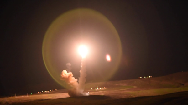 A US Minuteman III intercontinental ballistic missile is test-fired from Vandenberg Air Force Base in California toward a missile range in Kwajalein Atoll in the Marshall Islands, 4,200 miles away, on February 23, 2021 - Sputnik International
