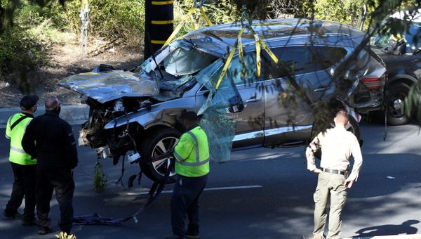The vehicle of golfer Tiger Woods, who was rushed to hospital after suffering multiple injuries, is lifted by a crane after being involved in a single-vehicle accident in Los Angeles, California, U.S. February 23, 2021. - Sputnik International