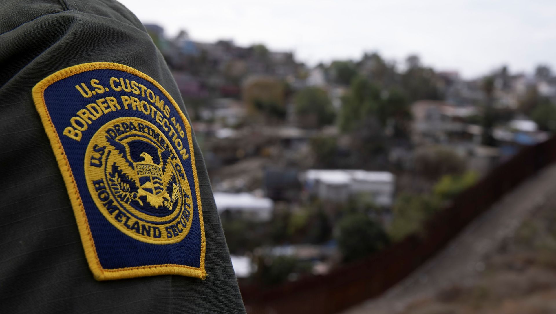 A U.S. border patrol agent looks out over Tijuana, Mexico from the U.S. Mexico border wall in San Diego, California, U.S., February 2, 2021 A U.S. border patrol agent looks out over Tijuana, Mexico from the U.S. Mexico border wall in San Diego, California, U.S., February 2, 2021 - Sputnik International, 1920, 18.03.2021