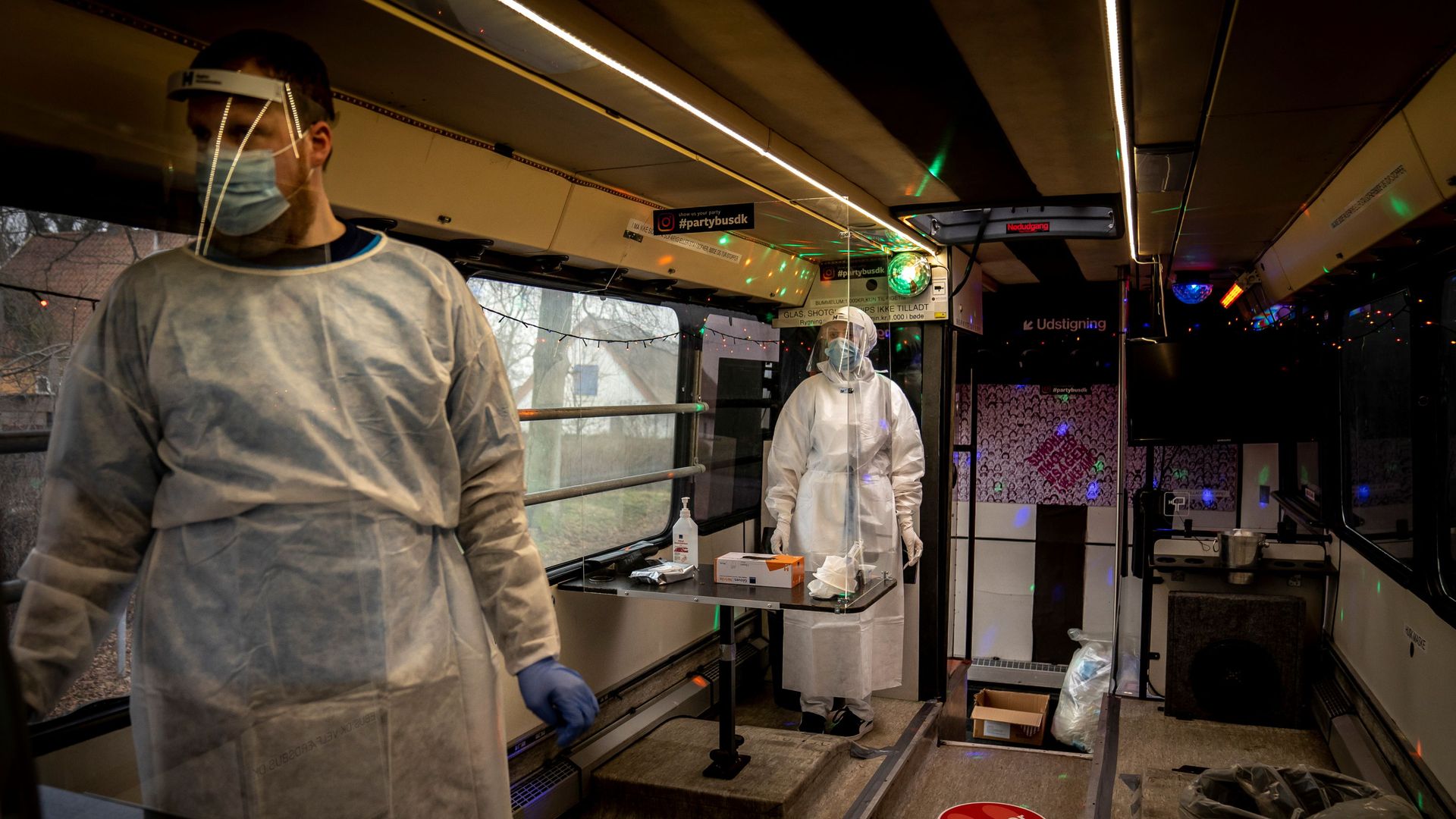 Healthcare workers wait in the Partybus, where people can listen to music while being tested for the coronavirus disease (COVID-19), in Ishoej, Denmark February 23, 2021 Healthcare workers wait in the Partybus, where people can listen to music while being tested for the coronavirus disease (COVID-19), in Ishoej, Denmark February 23, 2021 - Sputnik International, 1920, 26.02.2021