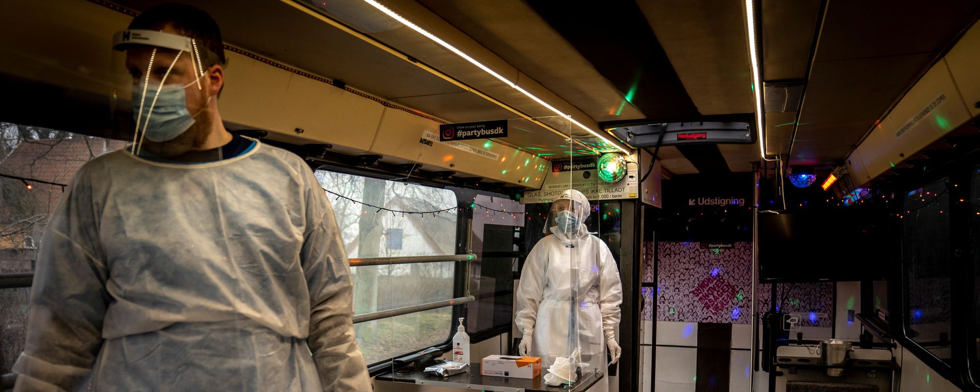 Healthcare workers wait in the Partybus, where people can listen to music while being tested for the coronavirus disease (COVID-19), in Ishoej, Denmark February 23, 2021 Healthcare workers wait in the Partybus, where people can listen to music while being tested for the coronavirus disease (COVID-19), in Ishoej, Denmark February 23, 2021 - Sputnik International, 1920, 26.02.2021