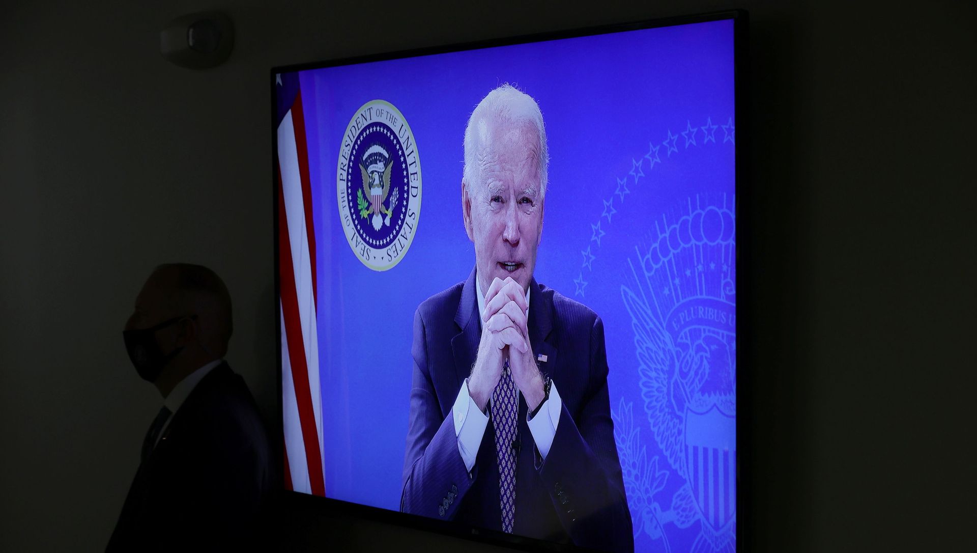 U.S. President Joe Biden is seen on a video display as he delivers remarks virtually to the National Governors Association Winter Meeting from the South Court Auditorium at the White House in Washington, U.S., February 25, 2021 U.S. President Joe Biden is seen on a video display as he delivers remarks virtually to the National Governors Association Winter Meeting from the South Court Auditorium at the White House in Washington, U.S., February 25, 2021 - Sputnik International, 1920, 02.03.2021
