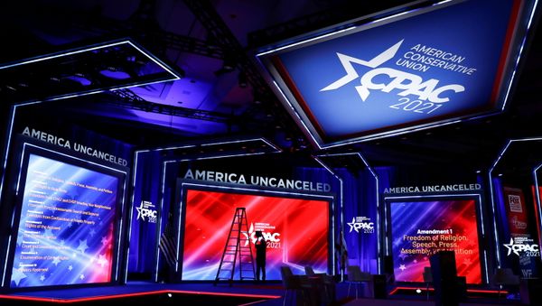 Technicians work on the stage before the start of the Conservative Political Action Conference (CPAC) in Orlando, Florida, U.S. February 25, 2021. - Sputnik International