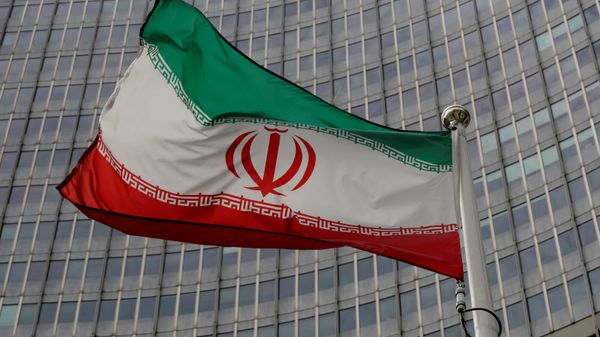 An Iranian flag flutters in front of the International Atomic Energy Agency (IAEA) headquarters in Vienna, Austria, September 9, 2019.  - Sputnik International
