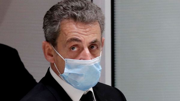 Former French President Nicolas Sarkozy leaves the courtroom during his trial on charges of corruption and influence peddling, at Paris courthouse, France, December 7, 2020. REUTERS/Benoit Tessier/File Photo - Sputnik International